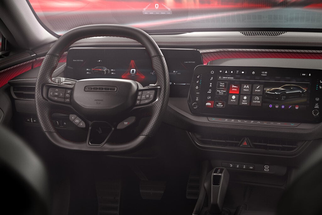 Interior shot of digital dashboard and steering wheel of Dodge Charger
