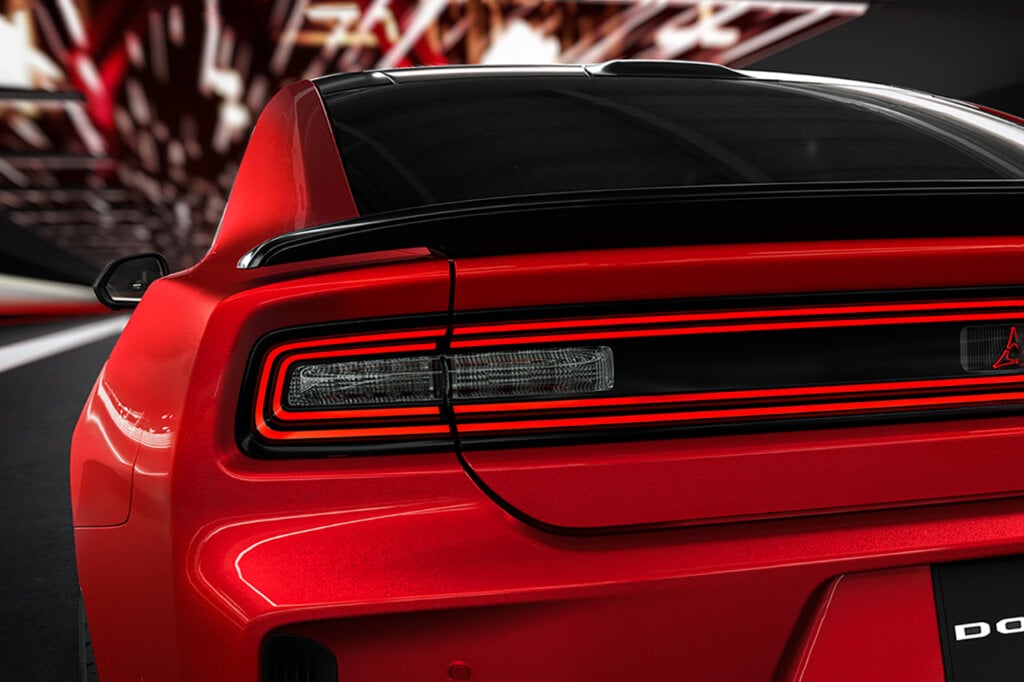 Detail shot of rear wing and taillights of red charger