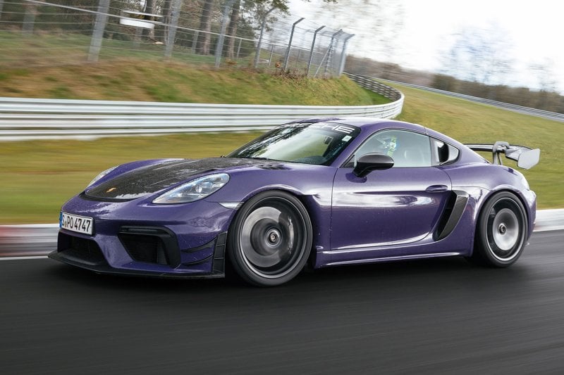 Purple GT4RS driving on a racetrack