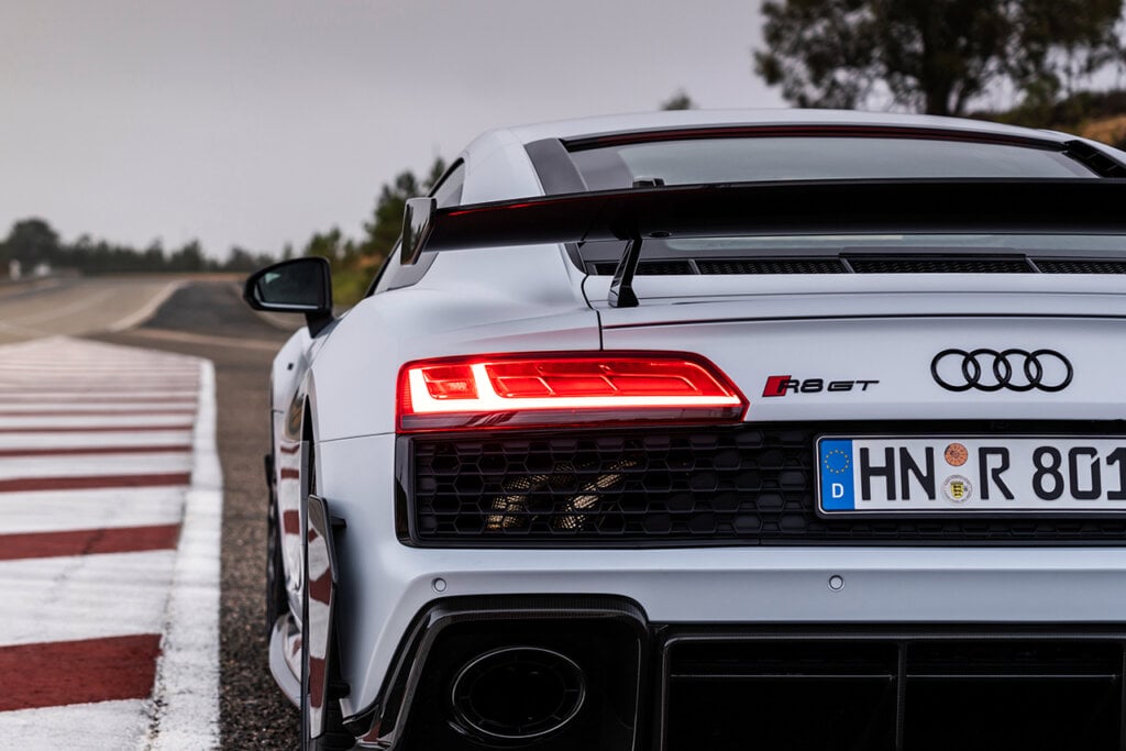 white R8 next to the side marker of a racetrack