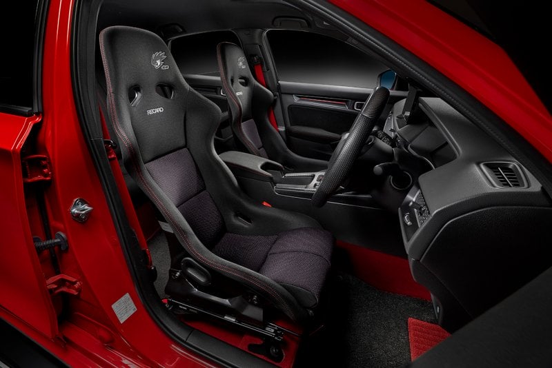upgraded bucket seats of the driver and passenger seats of a red car