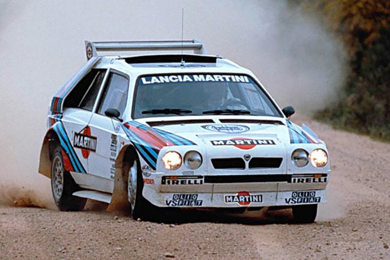 Lancia Delta S4 driving on a dirt road