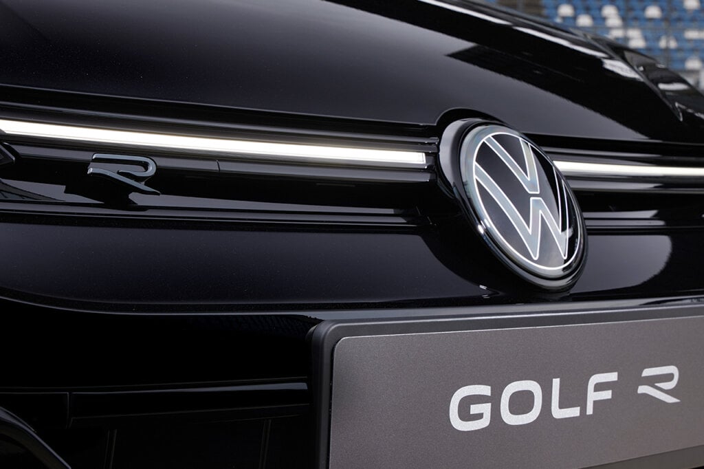 VW Golf R badge on front of a black car