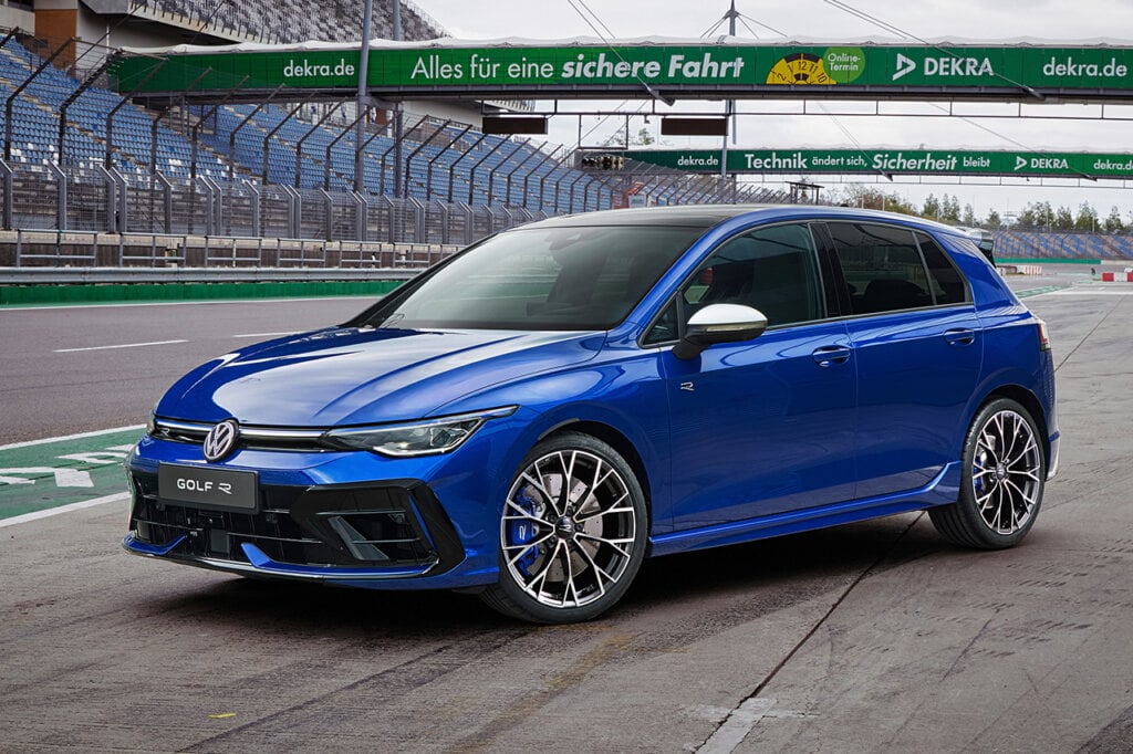 Blue VW Golf R parked at an angle on a racetrack